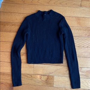 Black turtle neck slightly cropped sweater